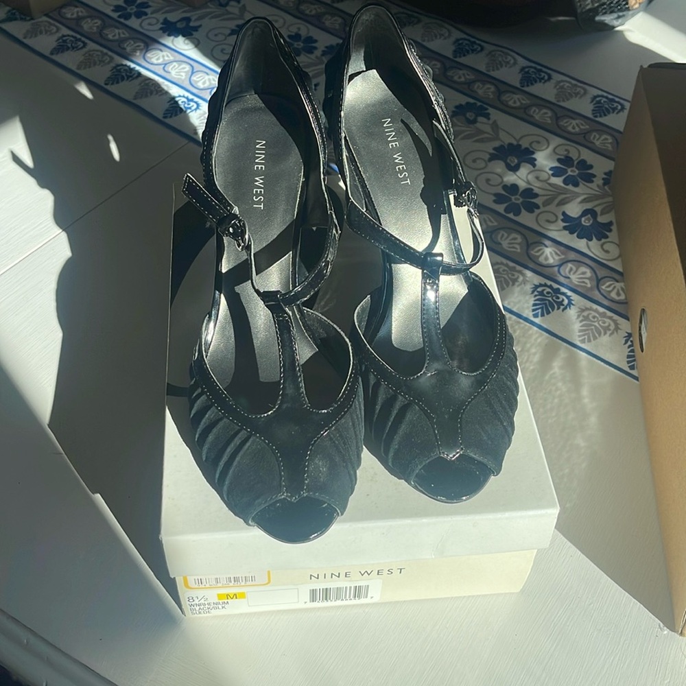 Women’s black suede heels